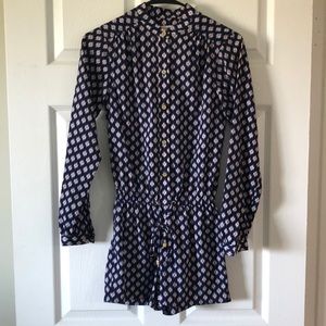 Navy romper with orange flowers, gold buttons